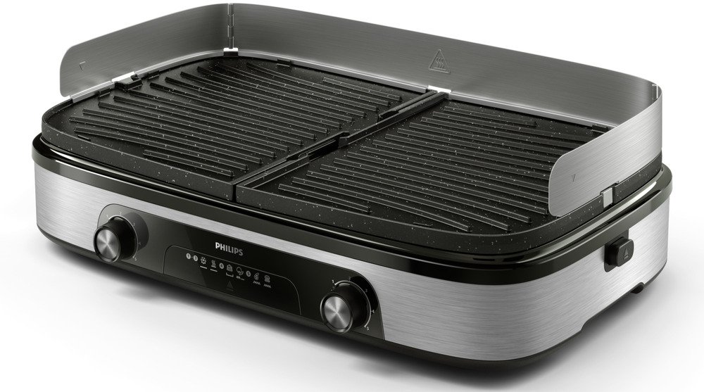 Geniet van de smaken van thuis grillen met de Philips-tafelgrill. Twee verwarmingszones en omkeerbare platen bieden veelzijdig koken en perfecte resultaten.